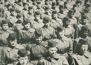 Women stand in formation after being issued First Army green uniform