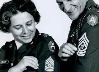 Sgt. Maj. Yzetta L. Nelson looks at her command sergeant major rank.